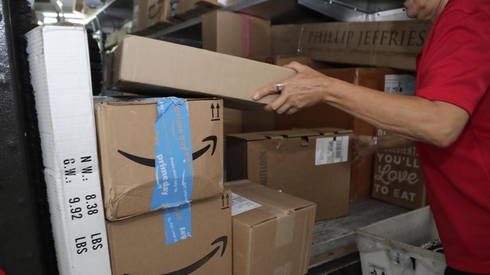 Amazon boxes being loaded on a truck during Prime Day 2018.