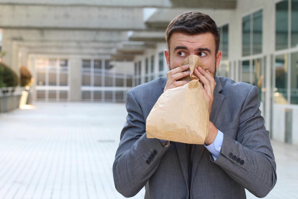 Businessman having a panic attack