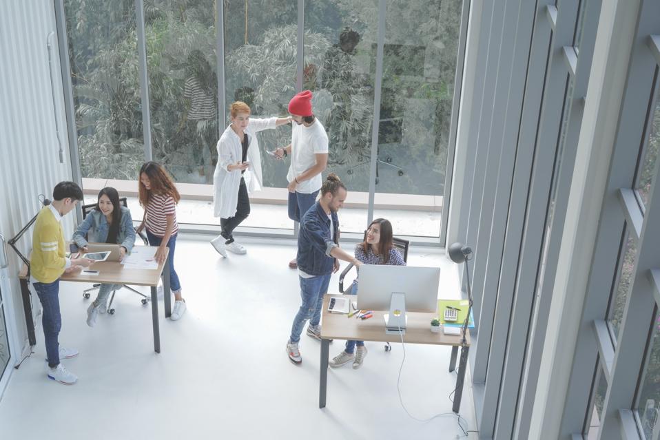 top view of group creative team in office