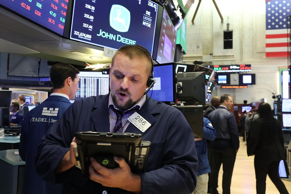 Dow Jones Industrials Average Falls Over 200 As Interest Rates Rises