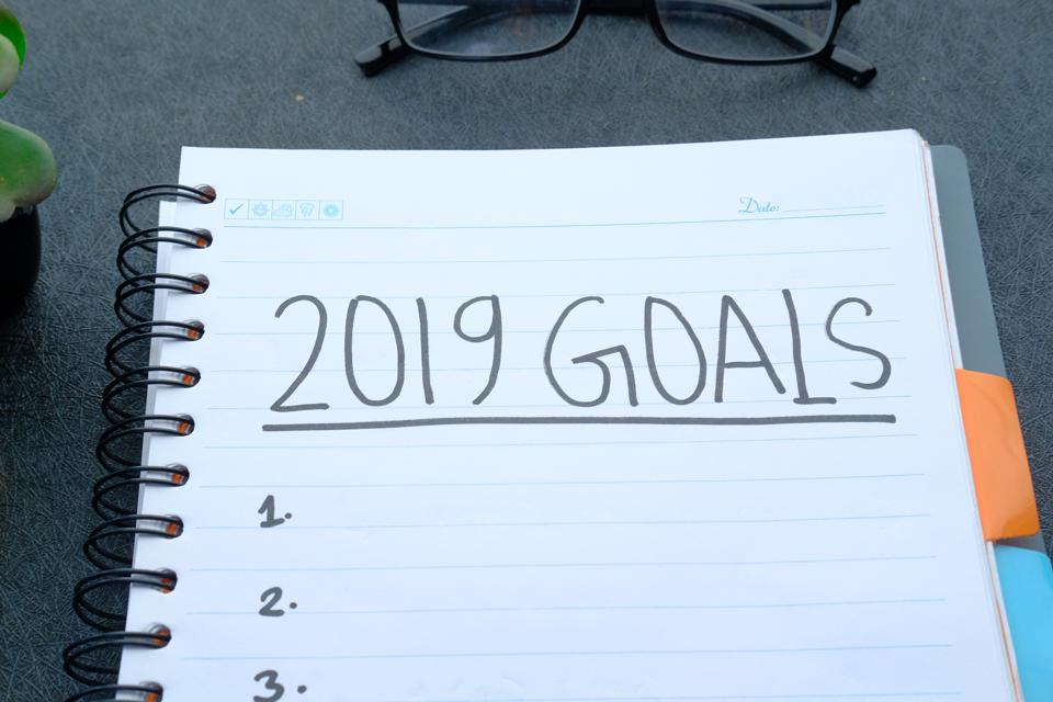 the year goals written on note pad