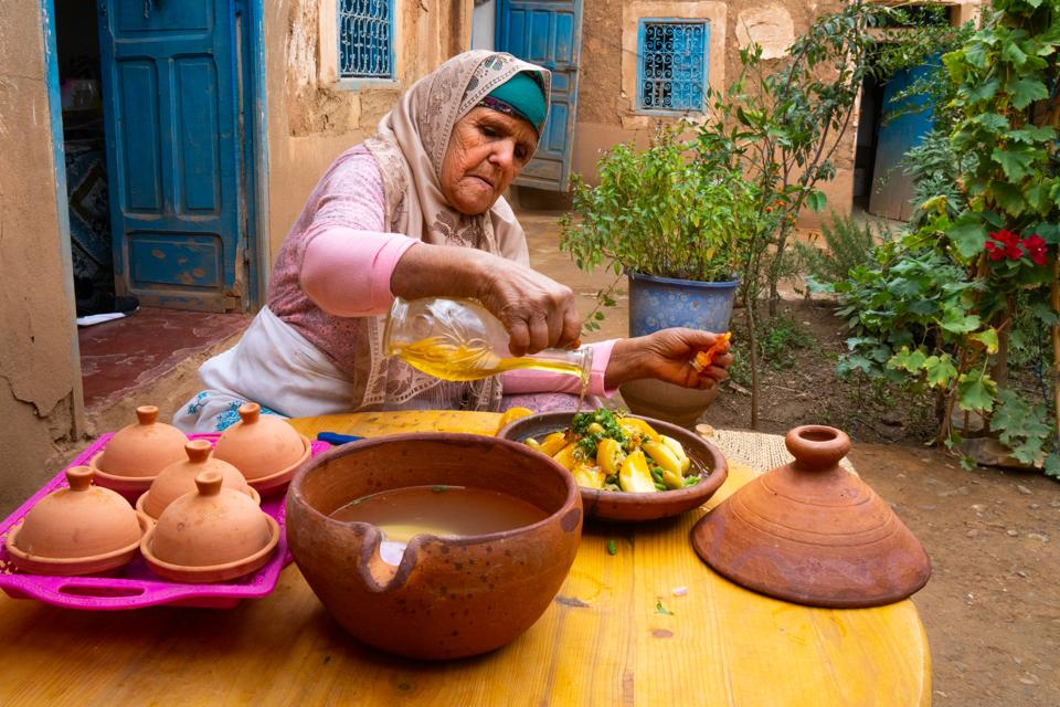 Portrait of Berber old woman in traditional dress, Agounssan, High Atlas, Morocco (Model Release)