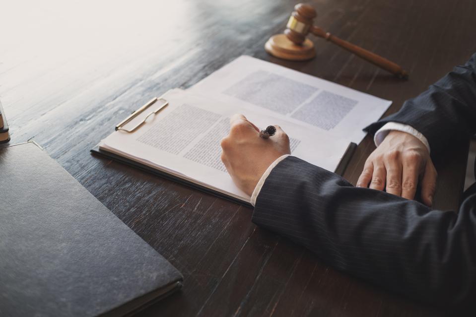 justice consultant working in courtroom / law firm.