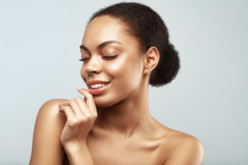 African American skincare models. Beauty spa treatment concept