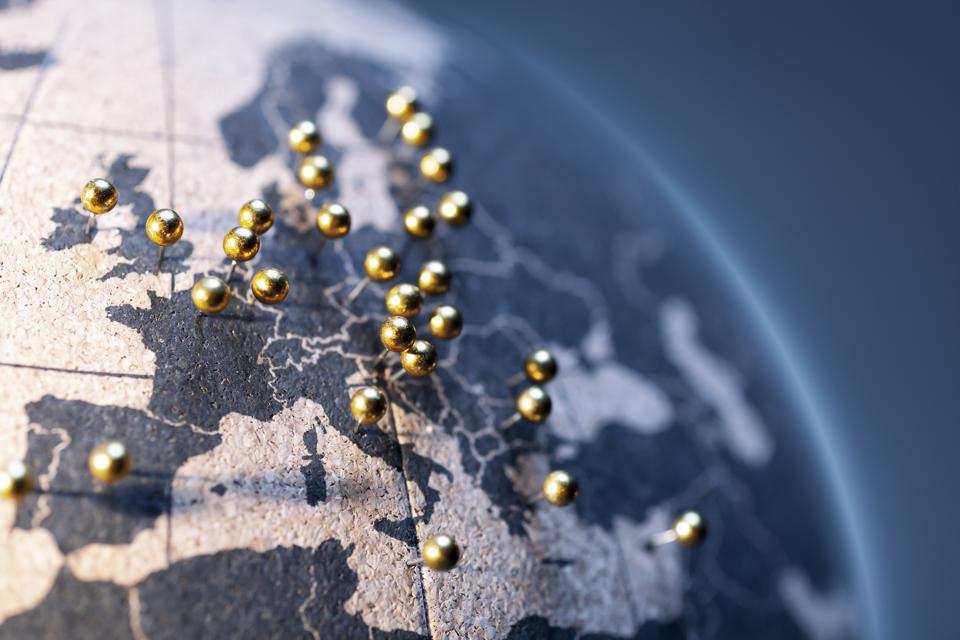 States and capitals of the European Union - Golden cork pegs on the globe
