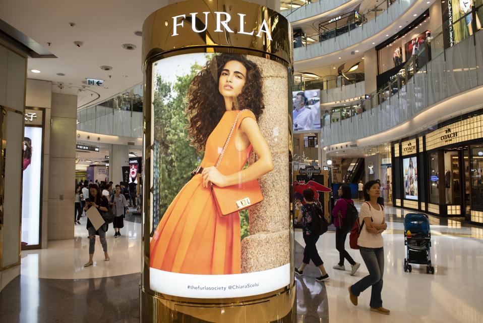 Italian clothing luxury brand Furla advertisement is seen at...