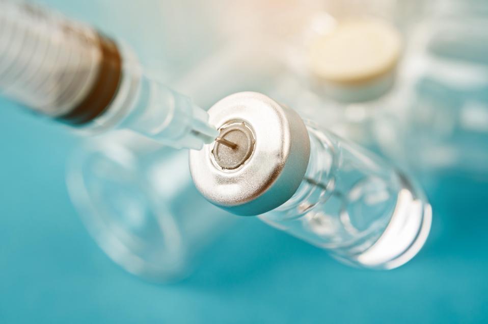 Vaccine vial dose with needle syringe,