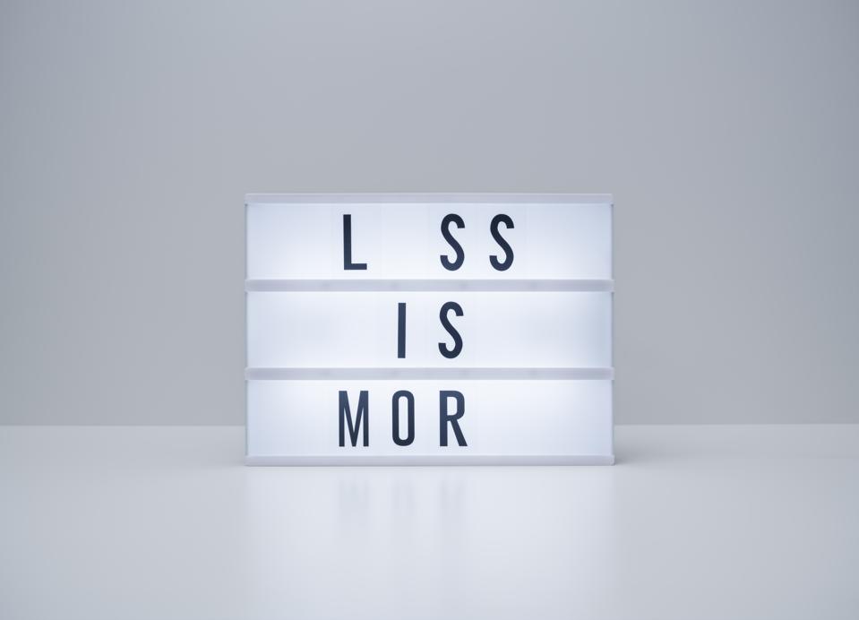 Incomplete text 'Less is more' on lightbox