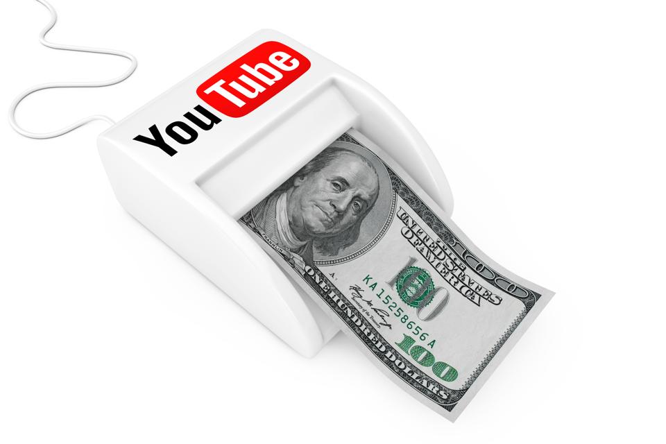 KIEV, UKRAINE - May, 17: Make Money with YouTube Concept. Money Maker YouTube Machine with Dollars Banknote. 3d Rendering