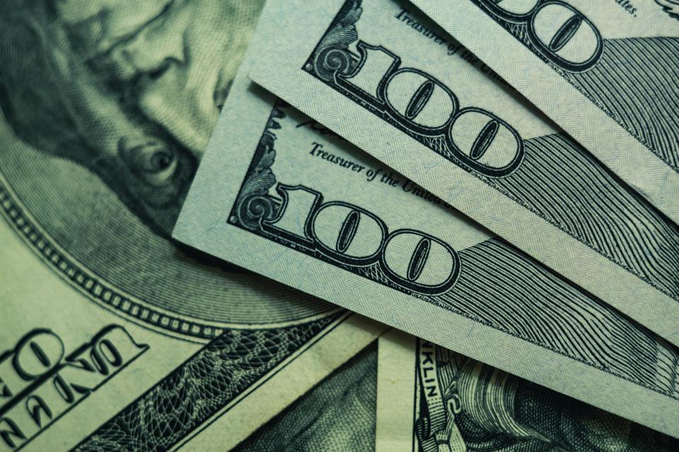 Close up Beautiful Dollars Background. American, US Dollars Cash Money. One Hundred Dollar Banknotes. Macro view.