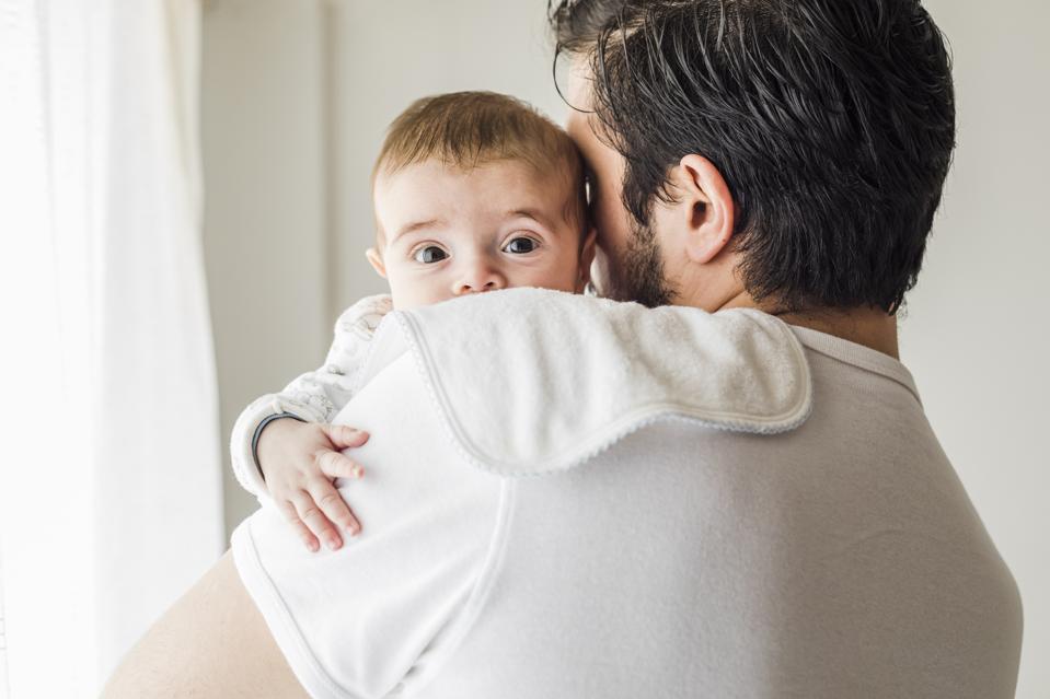 Father burping his baby