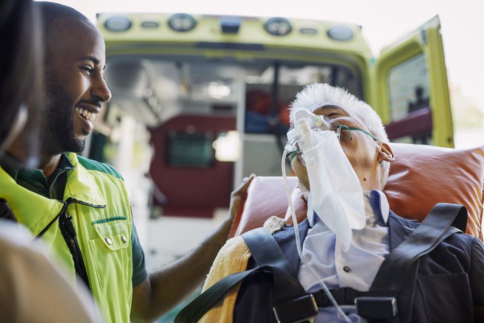 Patient receiving oxygen non-rebreather mask