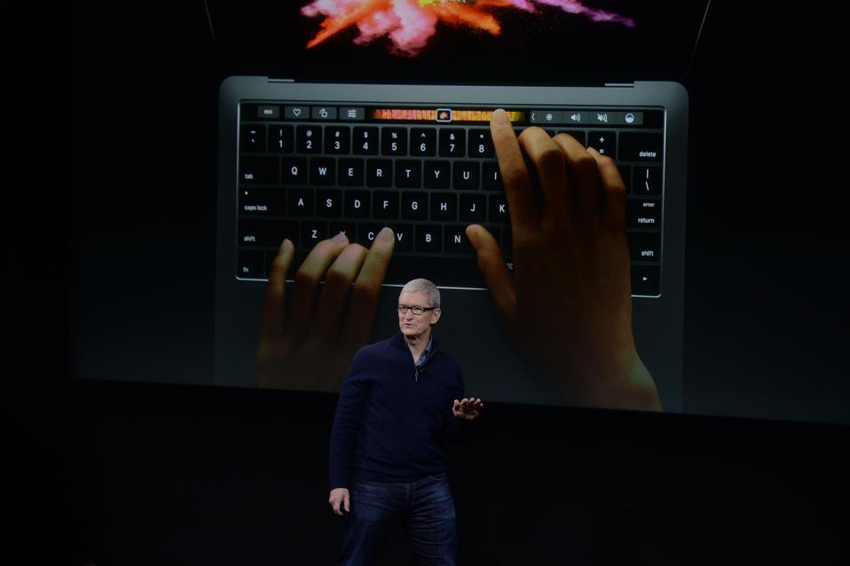 Apple CEO Tim Cook introduces the new MacBook Pro at a press event held at the company's headquarters in Cupertino, Calif., on Thursday, Oct. 27, 2016. (Dan Honda/Bay Area News Group)