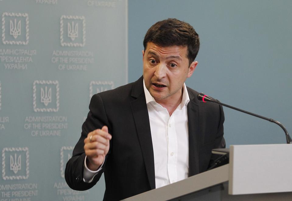 Ukrainian President Volodymyr Zelensky speaks during a press...