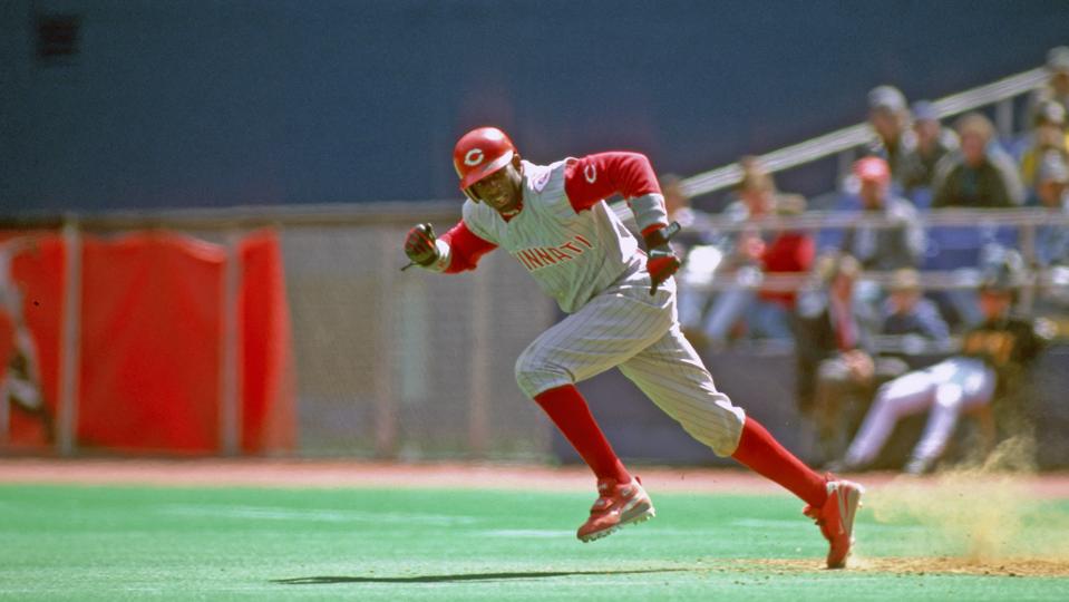 Deion Sanders goes for a stolen base vs the Pittsburgh Pirates in 1997.