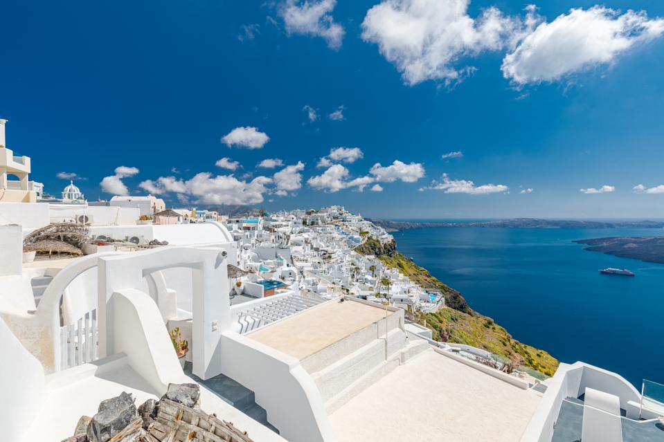 White architecture on Santorini island, Greece. Beautiful summer landscape, sea view.