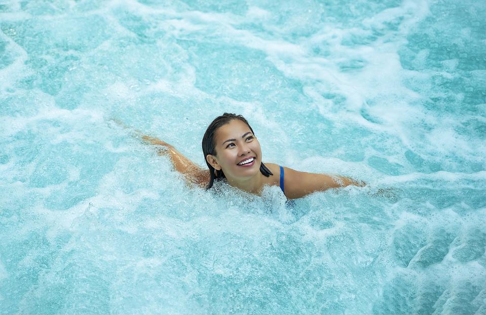 Woman in whirlpool or swim spa