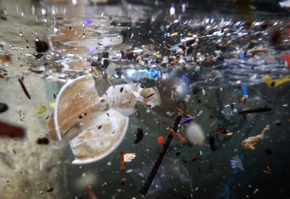 Plastic waste and debris underwater carried by the storm of...