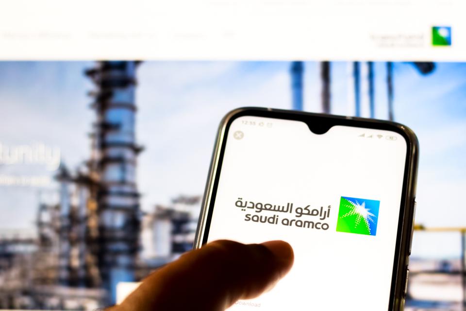 In this photo illustration the Saudi Arabian Oil Company (...