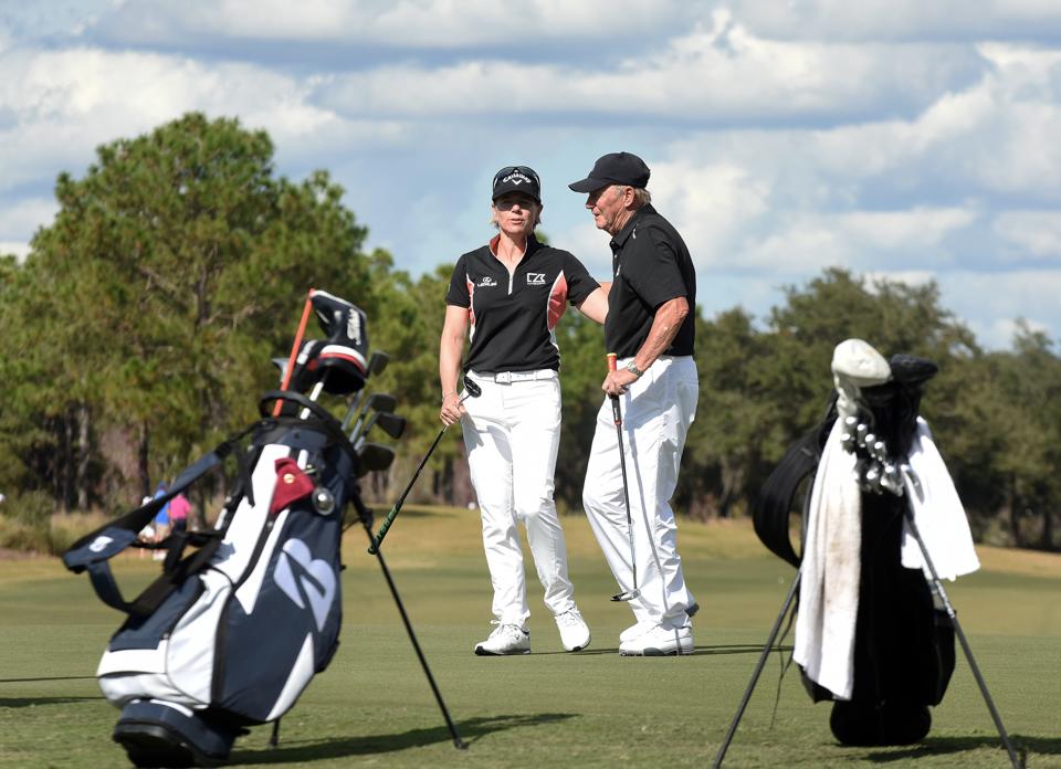 Swedish golfer Annika Sorenstam (left) embraces her father,...