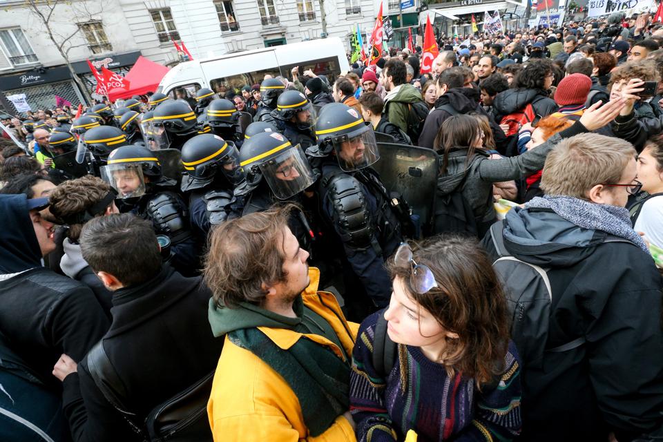 French Riots Add To Business Woes