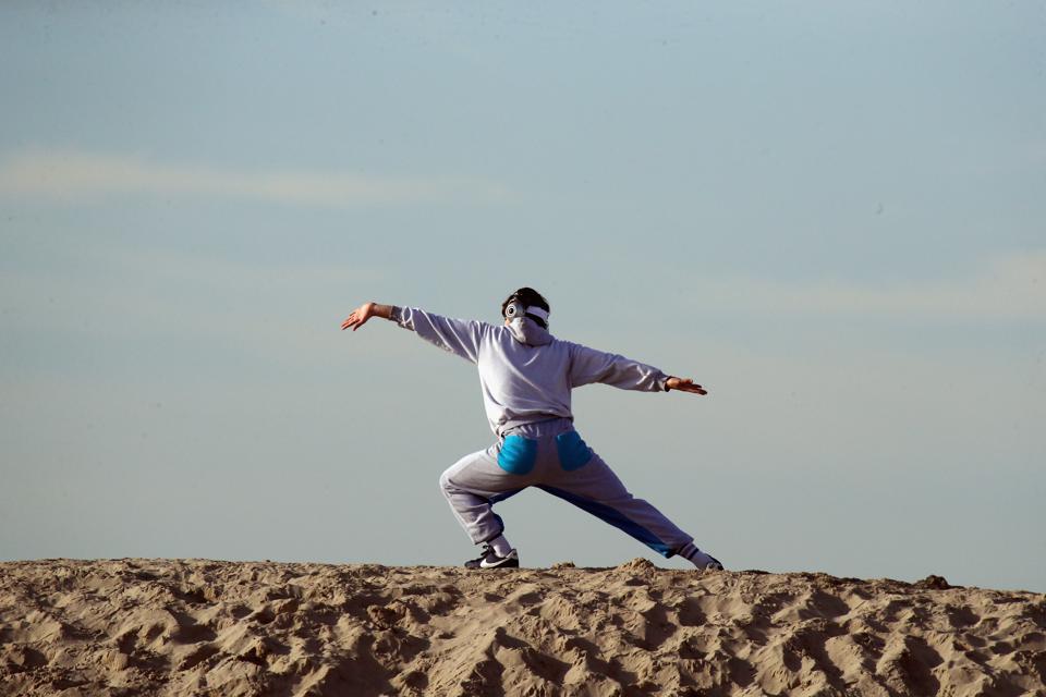 Venice Beach Scenics Man doing yoga staying calm
