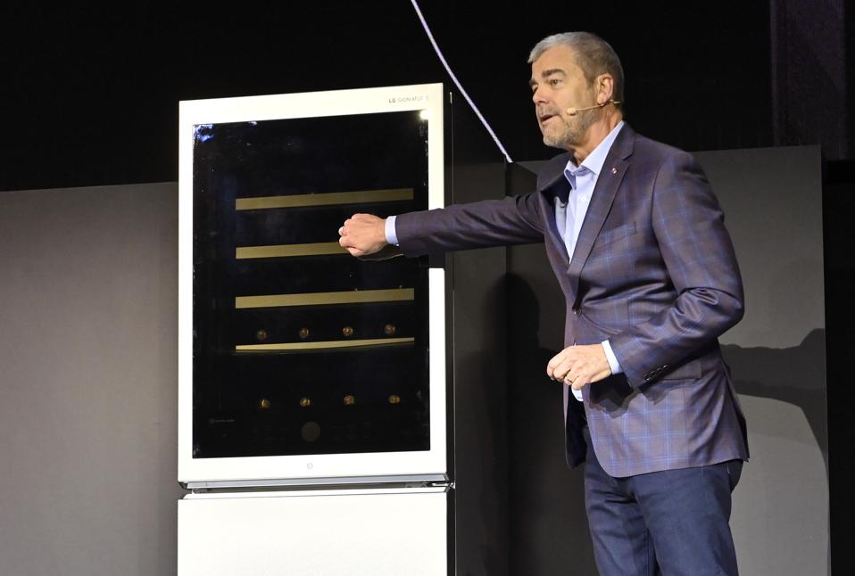 LG Electronics USA SVP of Marketing David VanderWaal demonstrates new LG tech at CES.