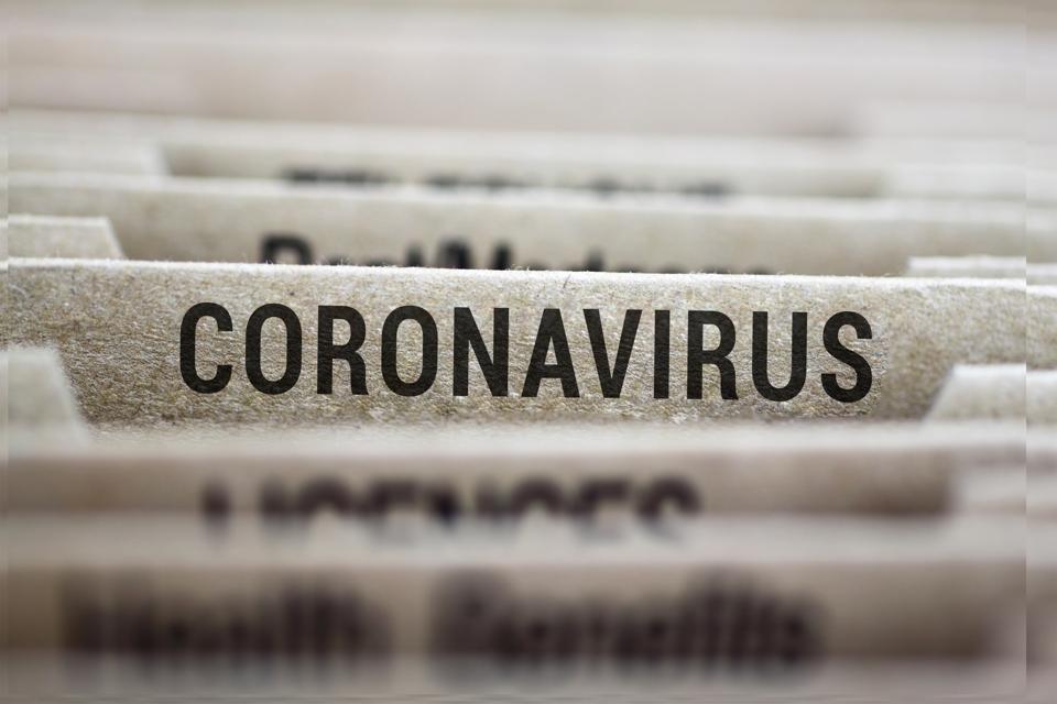 Coronavirus written on file folder label