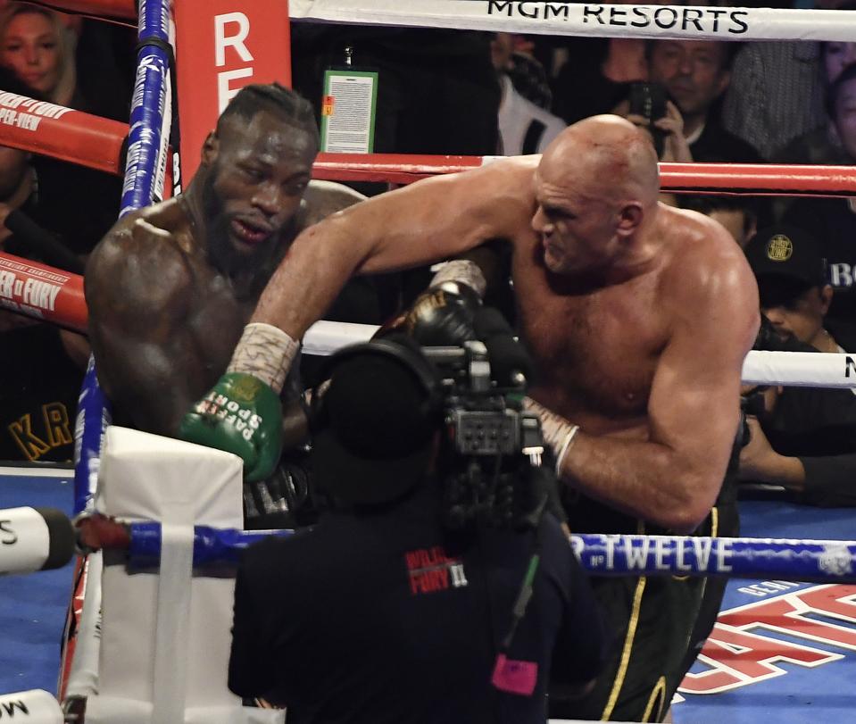 sportsbooks  winner  tyson fury scores tko  deontay wilder