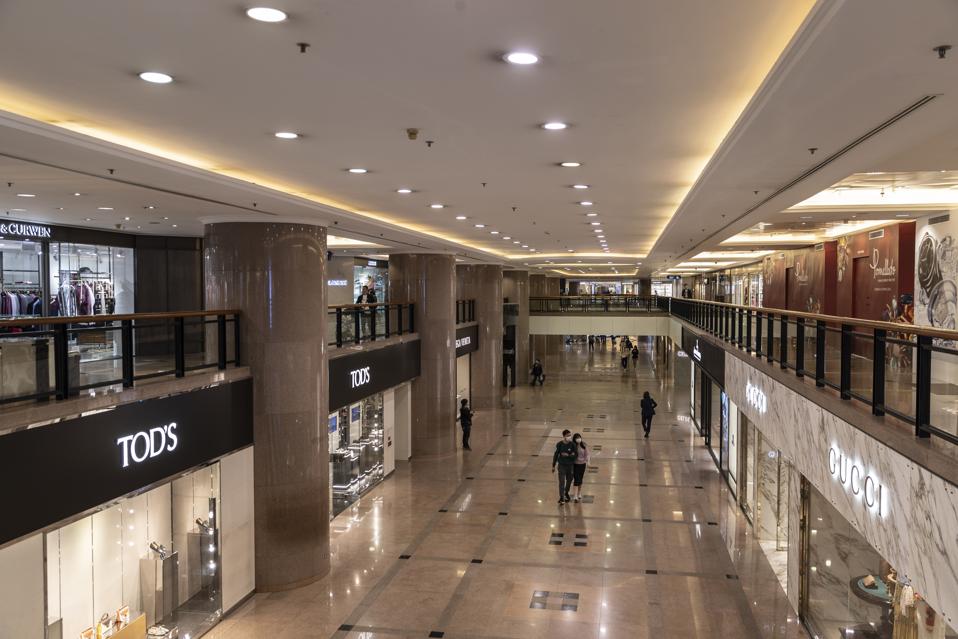 A quiet scene inside quiet and empty Harbour City Shopping...