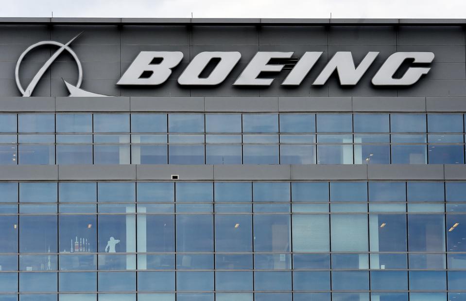 The Boeing regional headquarters is seen amid the coronavirus pandemic on April 29, 2020, in Arlington, Virginia. - Boeing announced sweeping cost-cutting measures Wednesday after reporting a first-quarter loss of $641 million following the hit to the airline business from the coronavirus pandemic. The aerospace giant plans to reduce its workforce by 10 percent through a combination of voluntary and involuntary layoffs and will slash production of its main commercial planes, including the 787 and 777, Chief Executive David Calhoun said in a message to employees that accompanied an earnings release. (Photo by Olivier DOULIERY / AFP) (Photo by OLIVIER DOULIERY/AFP via Getty Images)