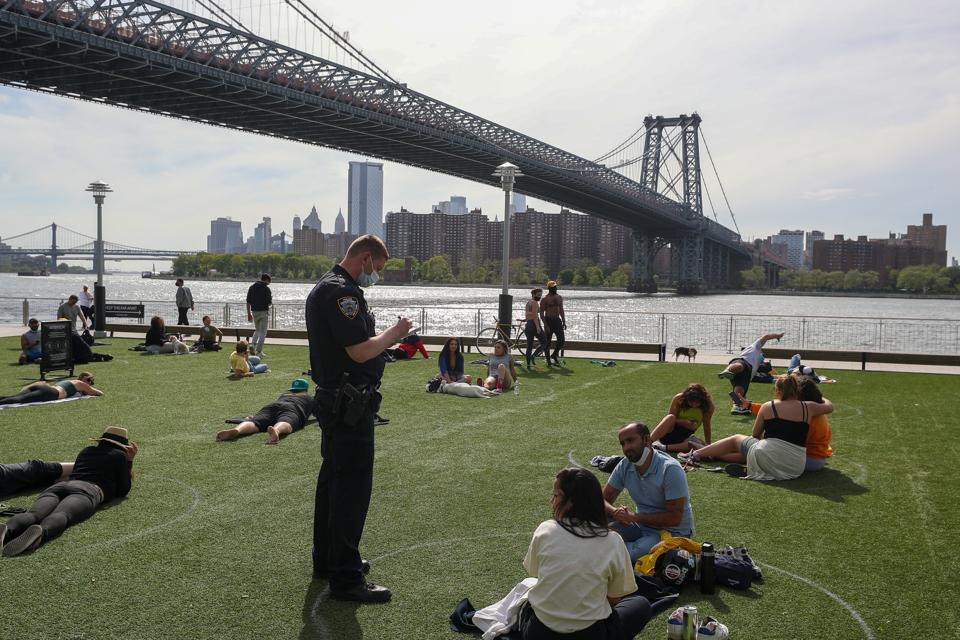 New Yorkers practicing social distancing at the Domino Park in NYC