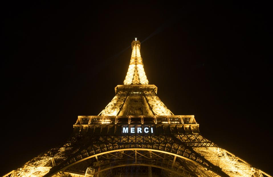 How The Eiffel Tower In Paris Is Lighting Up For French Coronavirus Carers