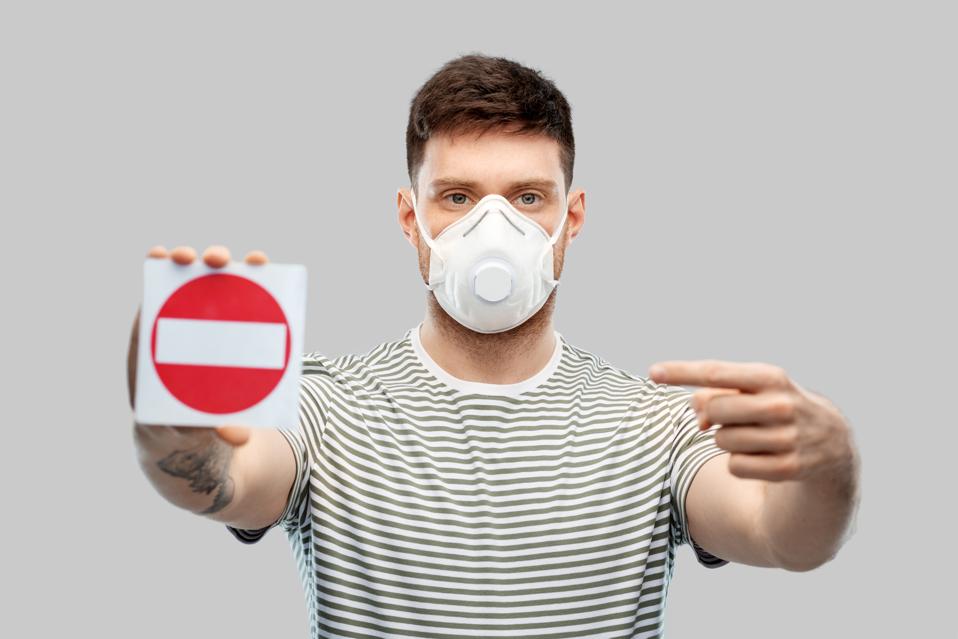 Why Some Cities And Counties Are Banning Face Masks With Valves