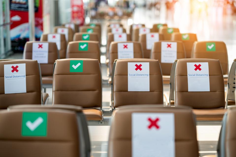 Social distance concept. keep spaced between each chairs make separate for social distancing, increasing physical space between people to avoid spreading illness during transmission of COVID-19.