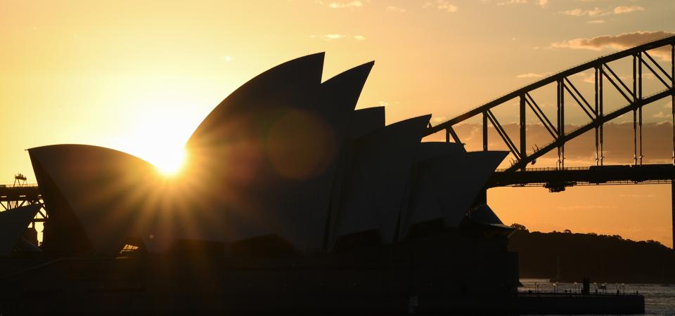 The iconic Sydney Opera House and Harbour Bridge at sunset on May 08, 2020 in Sydney, Australia. (Photo by James D. Morgan/Getty Images)