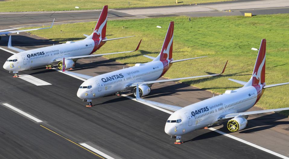 qantas cuts 6 000 jobs and grounds