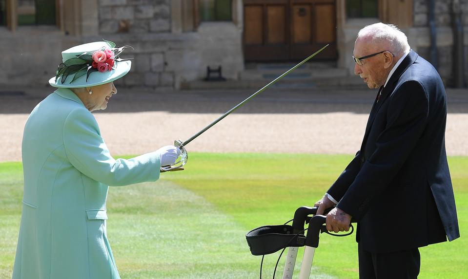 The Queen Confers The Honour Of Knighthood On Captain Sir Thomas Moore