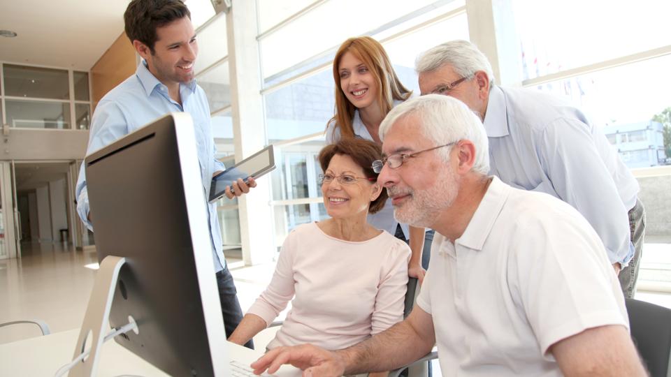 Senior people attending business training