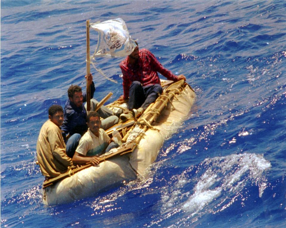 FILE --In this Aug. 26, 1994 file photo, Cuban refugees float in heavy seas 60 miles south of Key... [+] West, Fla. In the 20 years since Fidel Castro set off a high-seas humanitarian crisis by encouraging an exodus of 35,000 islanders, more than 26,000 other Cubans have risked their lives crossing the Florida Straits. Already this year, nearly 3,000 have been picked up by U.S. authorities, on a pace to double last year’s total. Experts say it shows the limits of the “wet-foot, dry-foot” policy that solved the 1994 crisis. (AP Photo/Dave Martin, File)