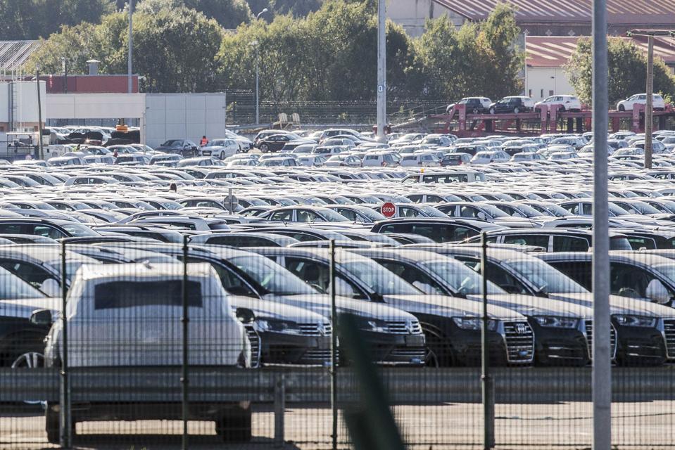 Volkswagen AG Automobiles Await Shipping At A Distribution Logistics Park As German Prosecutor Opens Emissions Probe Into Former CEO