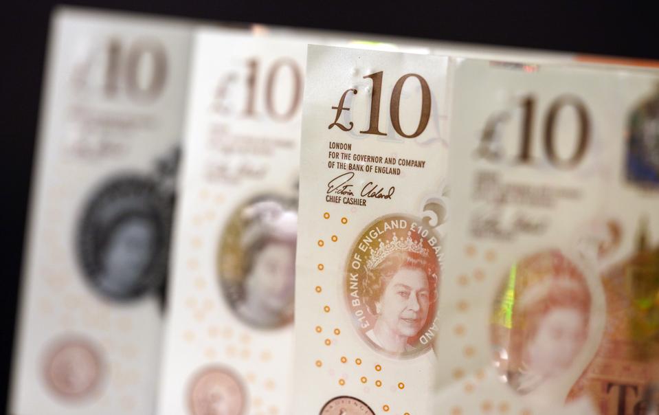 A row of British 10-pound banknotes
