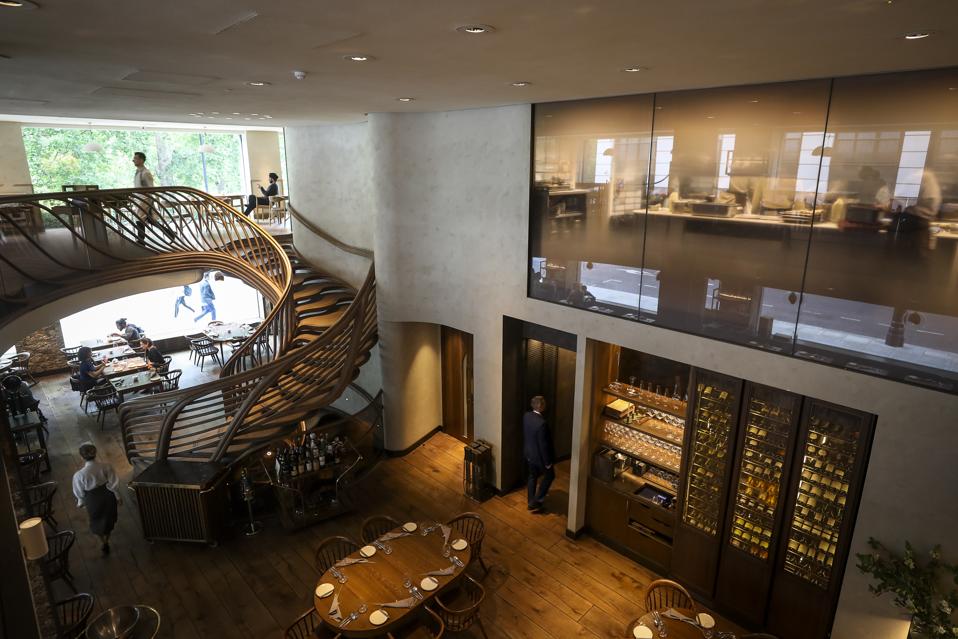 Hide, a three-story eatery in Mayfair London features a handcrafted spiral oak staircase