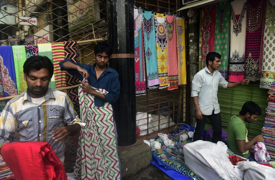 What The Wealth Of World's 8 Richest Tells Us About Asia's Poorest Workers