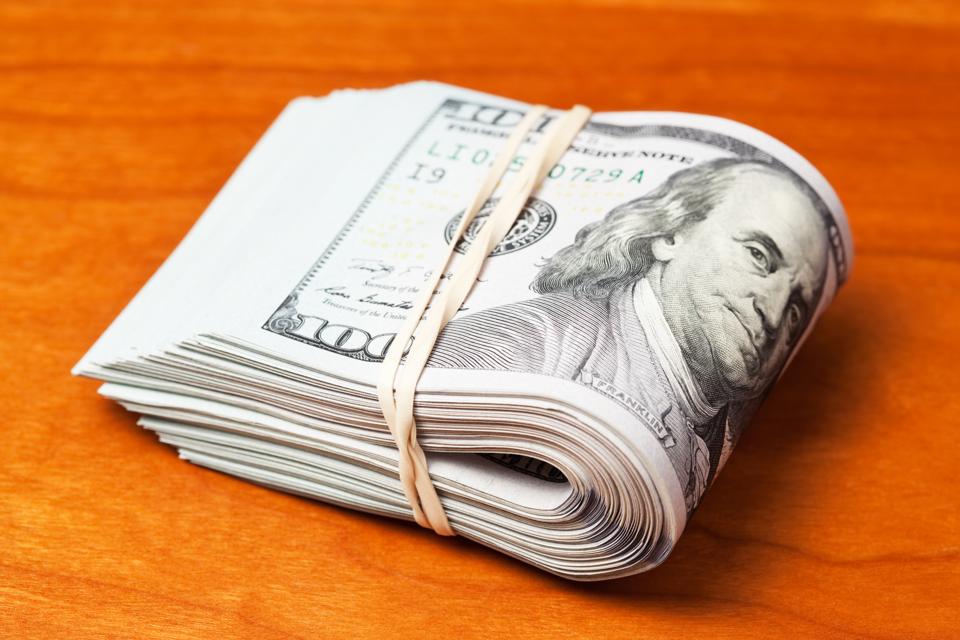 New US $100 Rubber Band Bill Bundle on Cherry Wood