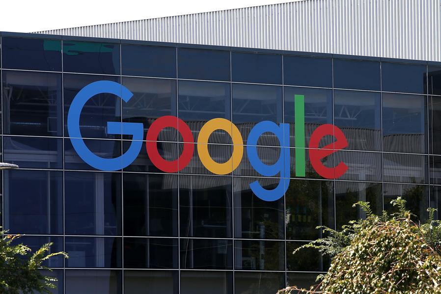 Alphabet's Stock Tops $1,000 To Hit Record High