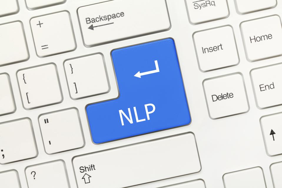 White conceptual keyboard - NLP (blue key)