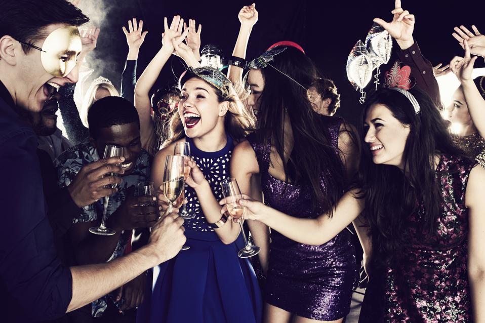 Group of friends dancing and having fun together