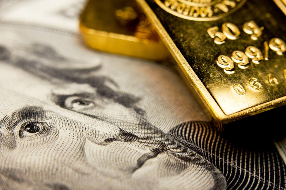 Banknote and a gold bullion