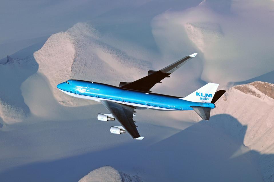 Greenland - : KLM Asia Boeing B747-400 is flying above the snowy mountains of Greenland